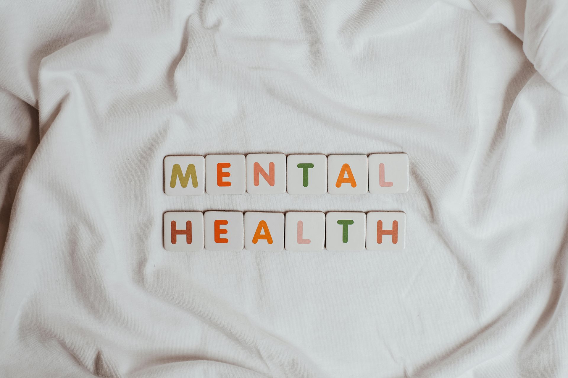 A cloth with the words Mental Health overlayed